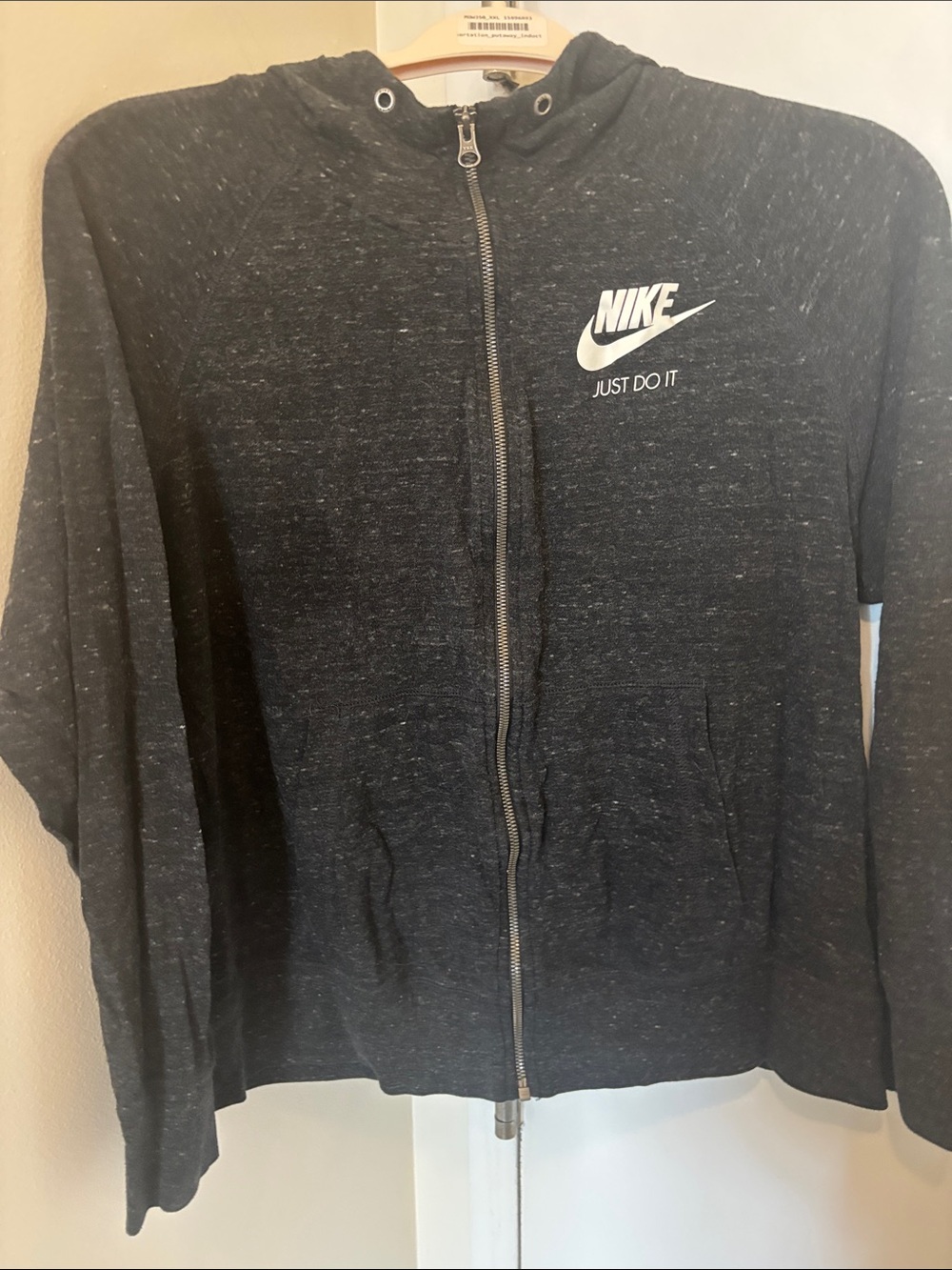 Nike Dark Heather Zip-Up Hoodie with White “Just do it” logo.